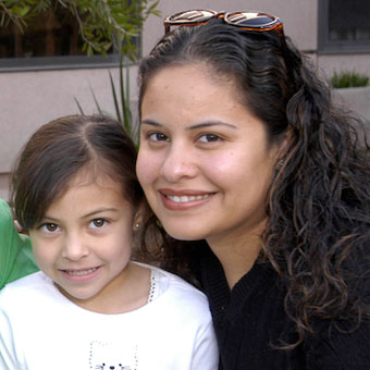 young volunteer mother and daughter