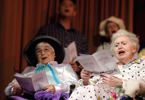 Residents singing at the annual Chanukah show