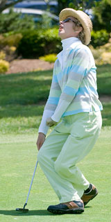 Woman with a postural expression of dismay having lost a shot